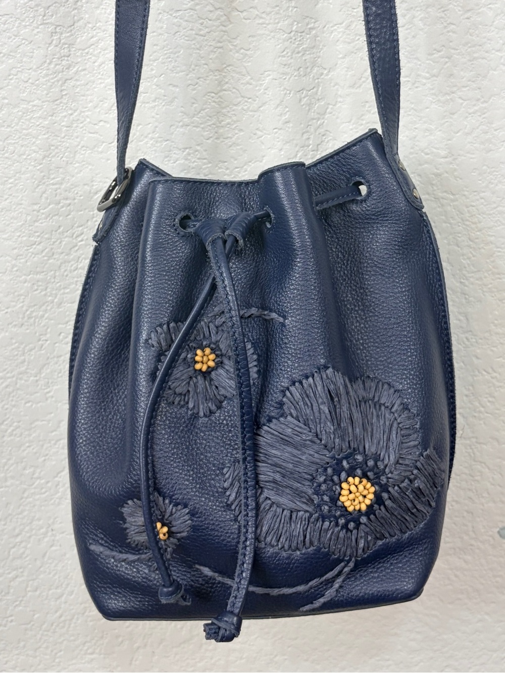 The SAK Teal Blue Leather Floral Appliqué Bucket Crossbody Bag Purse EUC